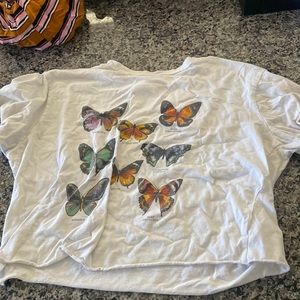 White loose butterfly tee. Fits more like a crop top